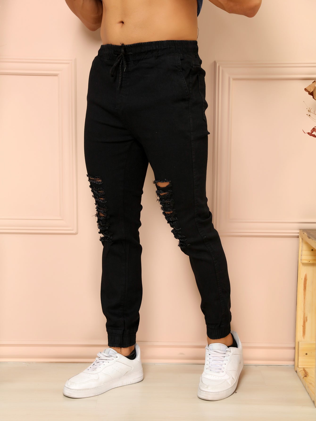 Calça jogger rasgada masculina pena com Elástico